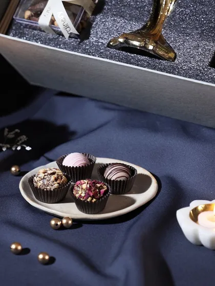 Celebrate Diwali with sweet surprises. This image highlights our assorted chocolate truffles, beautifully arranged and ready for gifting.