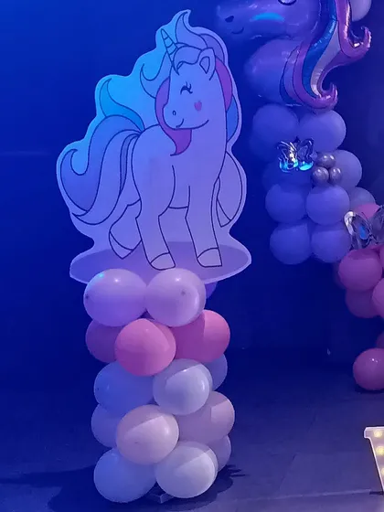Another unicorn character cutout used to enhance the theme throughout the party space.