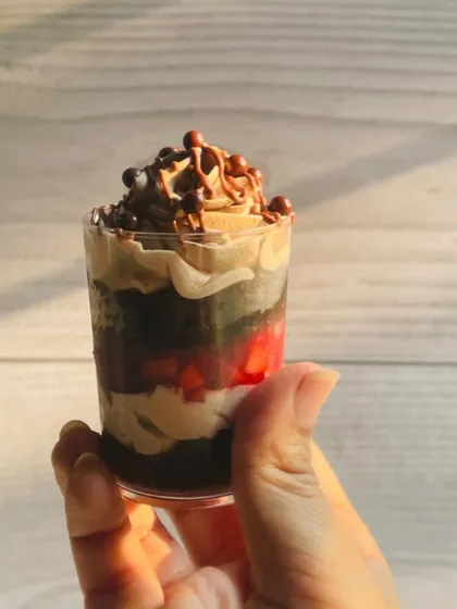 A single serving of my Nutella Mousse and Strawberry Shot. You can see the delicious layers of silky Nutella mousse and fresh strawberries, perfect for a balanced, rich dessert.