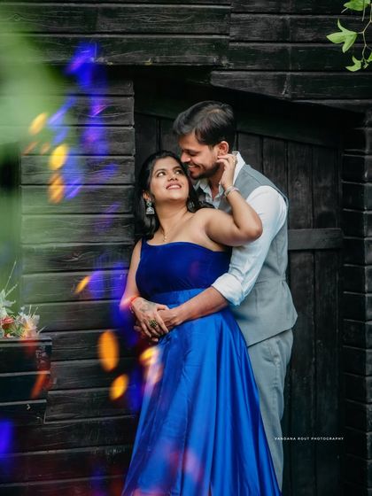 We find magic in unique locations, like this charming chapel-style building. The vibrant blue of her gown creates a beautiful contrast, making for a truly fairytale-like pre-wedding portrait.