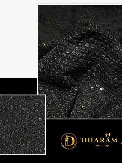 A close-up of a black fabric with a subtle, sparkling pattern. This material is perfect for a cocktail jacket or a modern tuxedo.