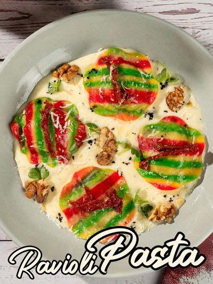 Our colorful Ravioli Pasta is a feast for the eyes and the palate. Each parcel is filled with deliciousness and served in a light, creamy sauce.