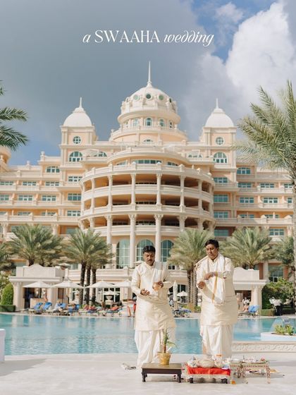 A serene poolside ritual against the grand backdrop of a palace hotel. I believe in using every part of a venue to create distinct experiences, blending sacred traditions with luxurious surroundings.