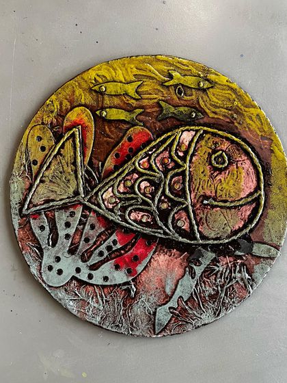 Another stunning example of a collagraph print from our workshops. The student has created a whimsical fish using different materials on the plate, resulting in a print with incredible texture and personality.