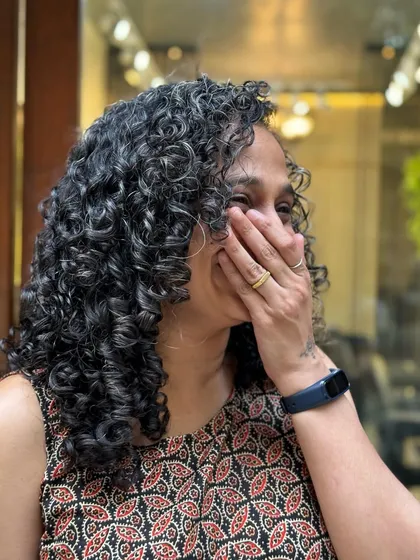 These smiles mean the world to me. I've been caring for this client's curls for two years, and it's been a joy to see her embrace her beautiful hair.