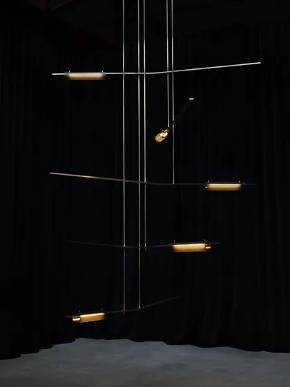 A large, multi-tiered Volant installation, showcasing its potential as a grand, kinetic-style sculpture for spaces with high ceilings.