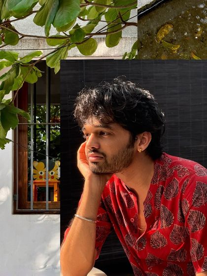 Lost in thought in the beautiful garden of a Pondicherry cafe.