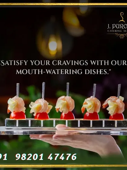 An example of my bite-sized appetizers, designed for easy mingling. Here, a hand holds a platter of delicate canapés, perfect for passing around at cocktail hours.