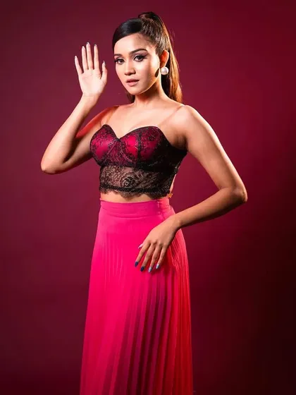 Barbie-inspired glam for a Clovia brand shoot with the lovely Ashi Singh. This look features a sharp winged liner and pink tones against a bold red background.