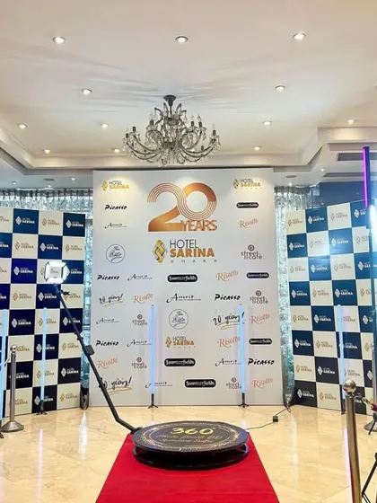 Here is my setup for Hotel Sarina's 20th-anniversary celebration. The booth was placed in front of the main event backdrop, ensuring the hotel's branding was featured prominently in every 360 video.