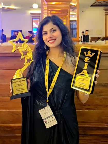 Another shot from the awards night, holding two of the trophies we were honored with. Each one represents a milestone in our journey and a promise to our students to always deliver our best.