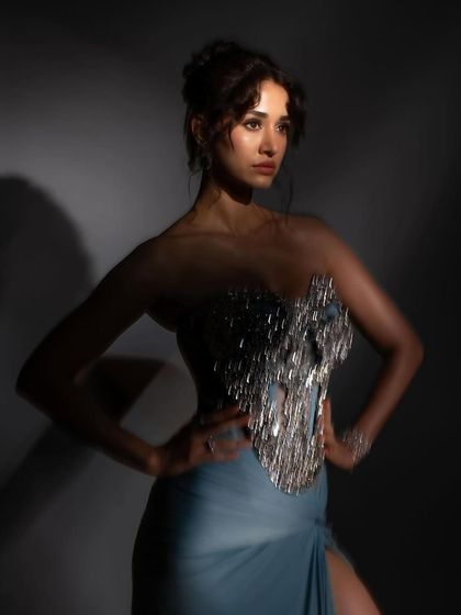 The play of light and shadow in this shot for ELLE India is incredible. The makeup was kept strong and defined to hold its own in such dramatic lighting conditions.