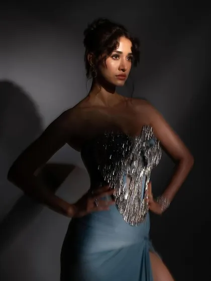 The play of light and shadow in this shot for ELLE India really makes the makeup pop. I focused on creating dimension and a flawless base that looked perfect under the dramatic studio lighting.
