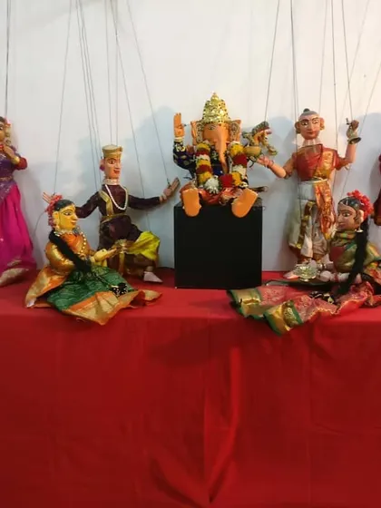 A group of puppets on display, led by Lord Ganesha. This collection includes musicians and dancers, representing the vibrant cultural life that we portray in our shows.