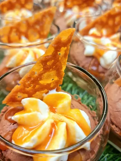 Decadent Dark Chocolate Mousse with Salted Caramel and a Parmesan Crisp. This was one of the sweet treats we served for the Wella store launch, adding a touch of indulgence to the celebration.