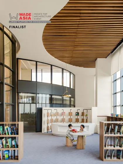 The library at Vedanya School, Gurugram, a project recognized as a finalist at the WADE ASIA awards. The design features curved balconies, abundant natural light, and child-friendly furniture to create an engaging environment for young learners.