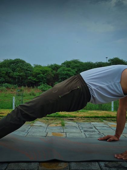 This is Purvottanasana, the Upward Plank Pose. I teach this to strengthen the wrists, ankles, and back, while also stretching the entire front of the body and improving shoulder mobility.