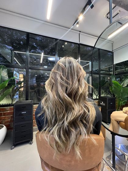 Another angle of this gorgeous lived-in colour. The placement of the highlights is customized to the client's haircut and style.