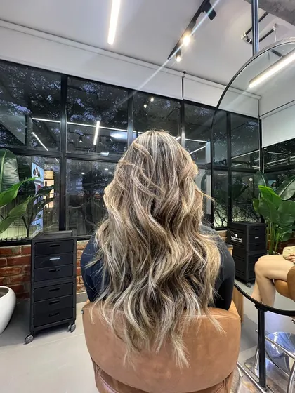 Another angle of this gorgeous lived-in colour. The placement of the highlights is customized to the client's haircut and style.
