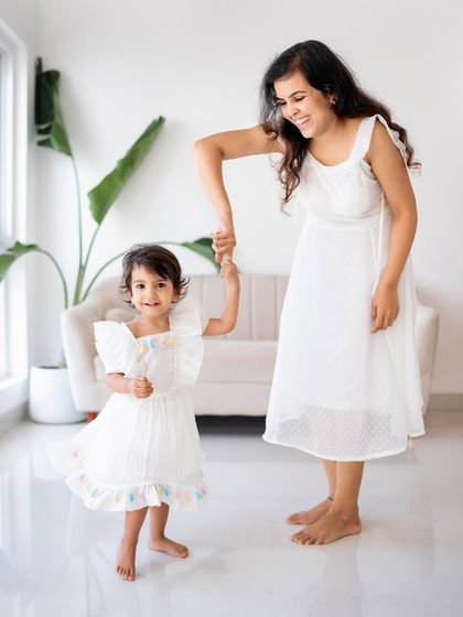 A mother and daughter dancing together in the studio. A moment of pure, unscripted joy.