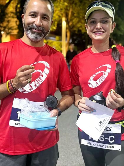 Sharing post-run fuel. We emphasize the importance of nutrition and recovery as part of our holistic coaching.