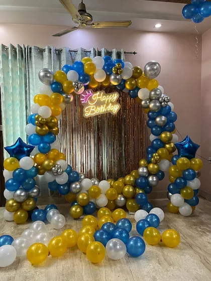 The full view of the colorful birthday decoration, perfect for a lively home party.