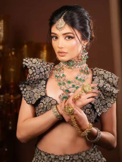The complete look, showcasing the intricate details of the outfit, jewelry, and makeup.