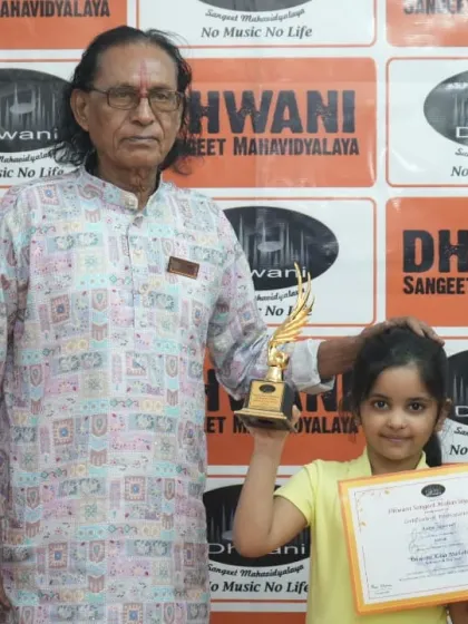 A senior guru with one of our youngest award winners.