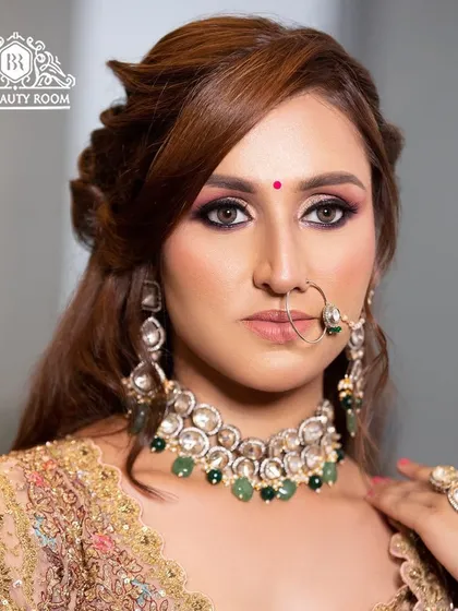 A detailed view of a glamorous bridal makeup look, featuring a sharp winged eyeliner and a flawless base. This is a great example of our HD makeup service for brides.
