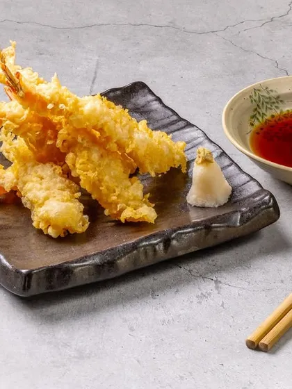 Our Prawn Tempura is a guest favorite, celebrated for its golden, crispy, and feather-light batter. Served with a traditional dipping sauce, it’s a classic Japanese dish executed to perfection.