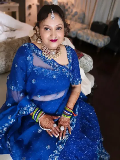 It's a special day for the family too. For the groom's mother, I created an elegant and sophisticated look with a classic updo and makeup that highlighted her grace, ensuring she felt beautiful and confident.