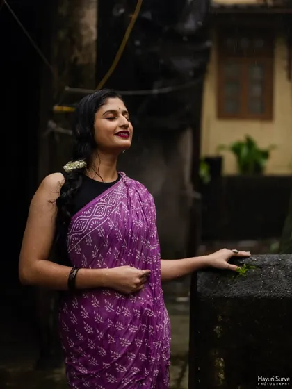 Capturing a moment of peace in a rustic alleyway. The soft light and the model's serene expression create a calm and beautiful portrait that feels both timeless and authentic.