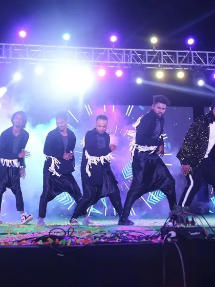 On stage, in the spotlight. This is a glimpse of a professional stage show, showcasing a dynamic group performance with full lighting and effects. I choreograph for events of all scales. 💫