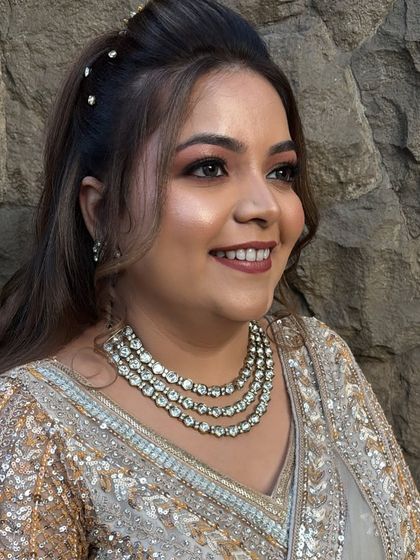 A beautiful, happy smile from my bride. For this look, I focused on creating a flawless, glowing base and a soft brown smokey eye that made her eyes sparkle.