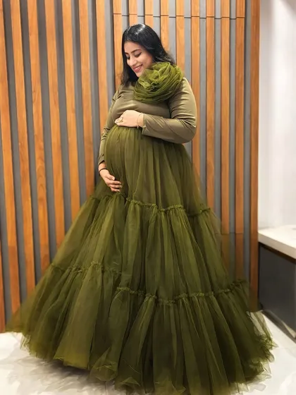 This olive green tiered gown is shown here in a family portrait, proving it's a wonderful choice for capturing moments with your loved ones.