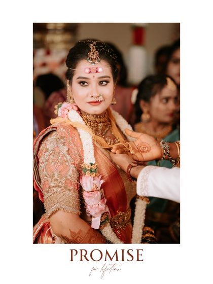 "Promise for a lifetime." A beautiful, emotional close-up of the bride during a key moment in the wedding ceremony. Her expression captures the weight and beauty of the ritual.