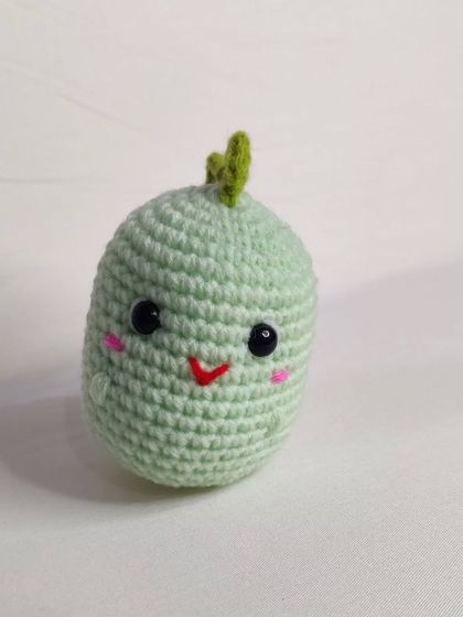 My tiny dino keychains are a handful of cuteness. They come in four different colors: blue, yellow, green, and grey.