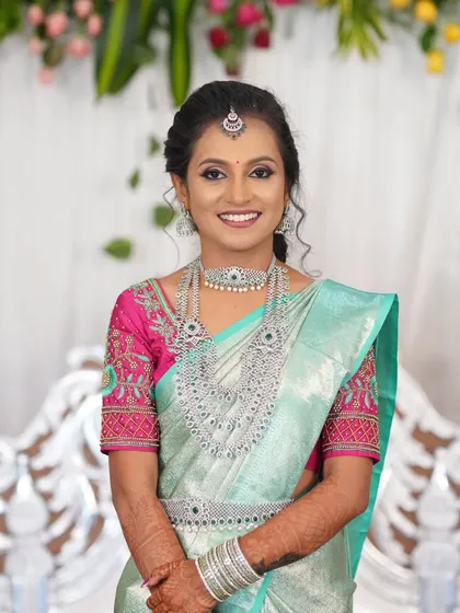 For a sparkling reception look, I recommend this stunning American Diamond jewellery set. The intricate design of the choker, long necklace, and matching earrings catches the light beautifully and pairs perfectly with modern sarees.