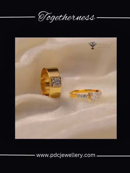 This couple's ring set symbolizes togetherness with a clean, modern aesthetic. The men's band is solid and bold with a central diamond cluster, perfectly complemented by the delicate, multi-stone ladies' ring.