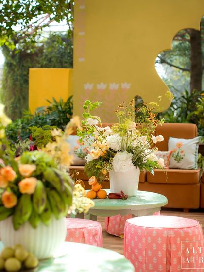 A detail shot from the 'Kesar Sehar' Haldi, where even the floral arrangements included fresh fruits and vegetables, adding an earthy and unexpected touch.