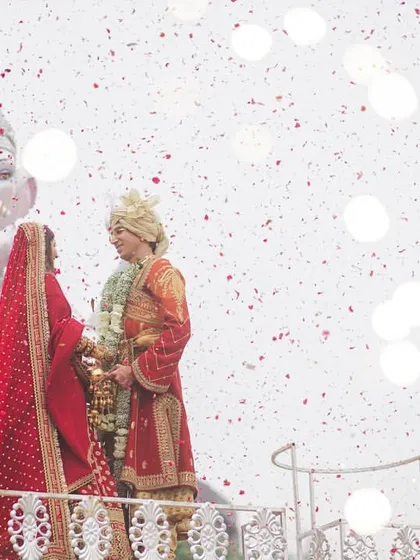 A dreamy, bokeh-filled shot of the Varmala ceremony, with the Ganesha statue in the background. We work with photographers to capture these artistic, beautiful frames.