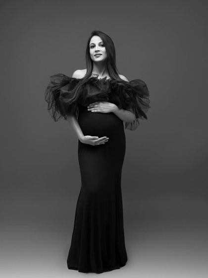 A frontal view of the same portrait, the monochrome edit gives it a classic, old-Hollywood glamour.