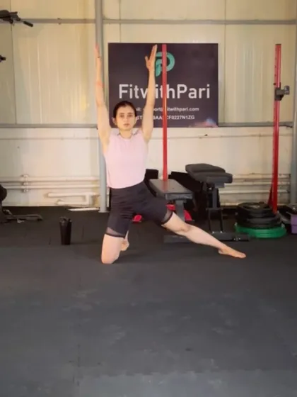 A kneeling side bend with arm reach. This is a beautiful Pilates exercise for stretching the obliques and lats while strengthening the core.