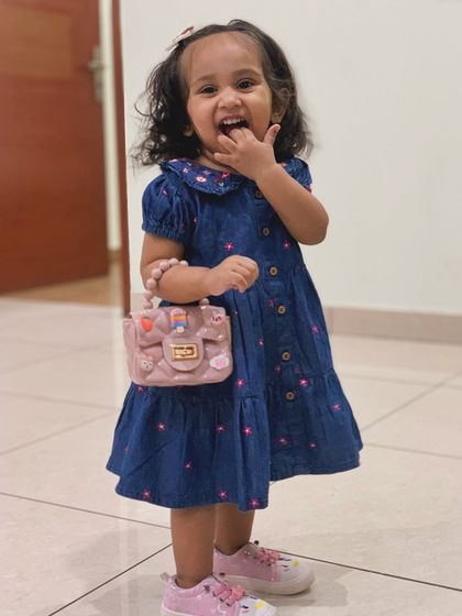 My daughter looking adorable in a denim dress from Firstcry. I love finding cute and comfortable summer outfits for her, and this one is a favorite.