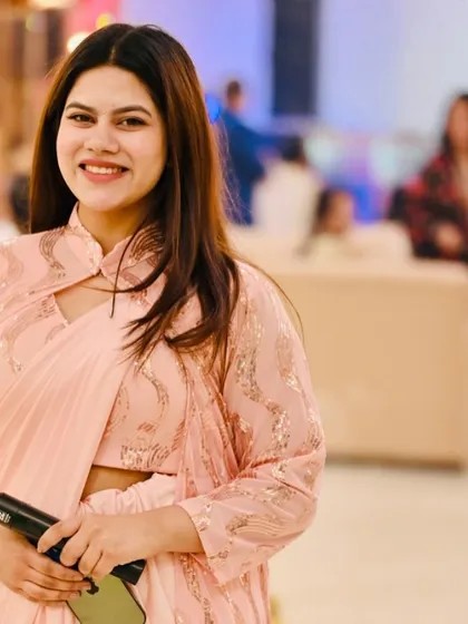 A self-love caption with a smile. Confidence is the best outfit an anchor can wear.
