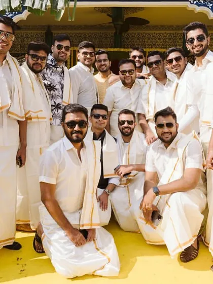 The groom's squad, dressed in traditional South Indian attire for the Haldi ceremony. Themed dress codes can add another layer of fun to the events.