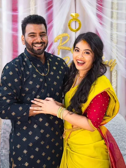 Pure joy and laughter. This candid shot shows the couple enjoying their special day, with the bride looking effortlessly beautiful.