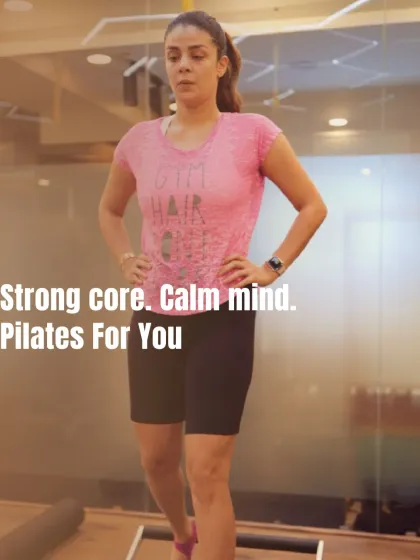 A strong core leads to a calm mind. This client stands with confident posture, a direct result of the deep core work that is central to my Pilates method.