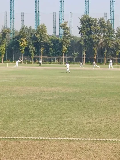 Another perspective of the competitive match, showcasing our well-maintained grounds and the professional environment we provide for youth cricket.