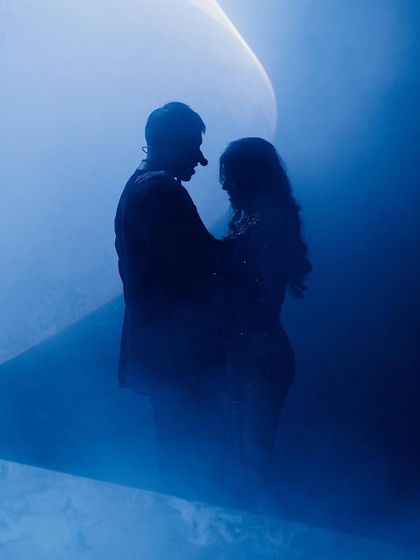 This silhouette shot captures the pure romance of a couple's dance. I use stage lighting and effects to create these beautiful, picture-perfect moments that you will treasure.